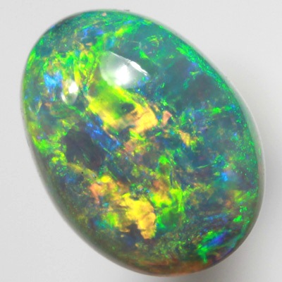 SOLID SEMI BLACK OPAL Very bright orange and green in a 3D pattern SEE VIDEO